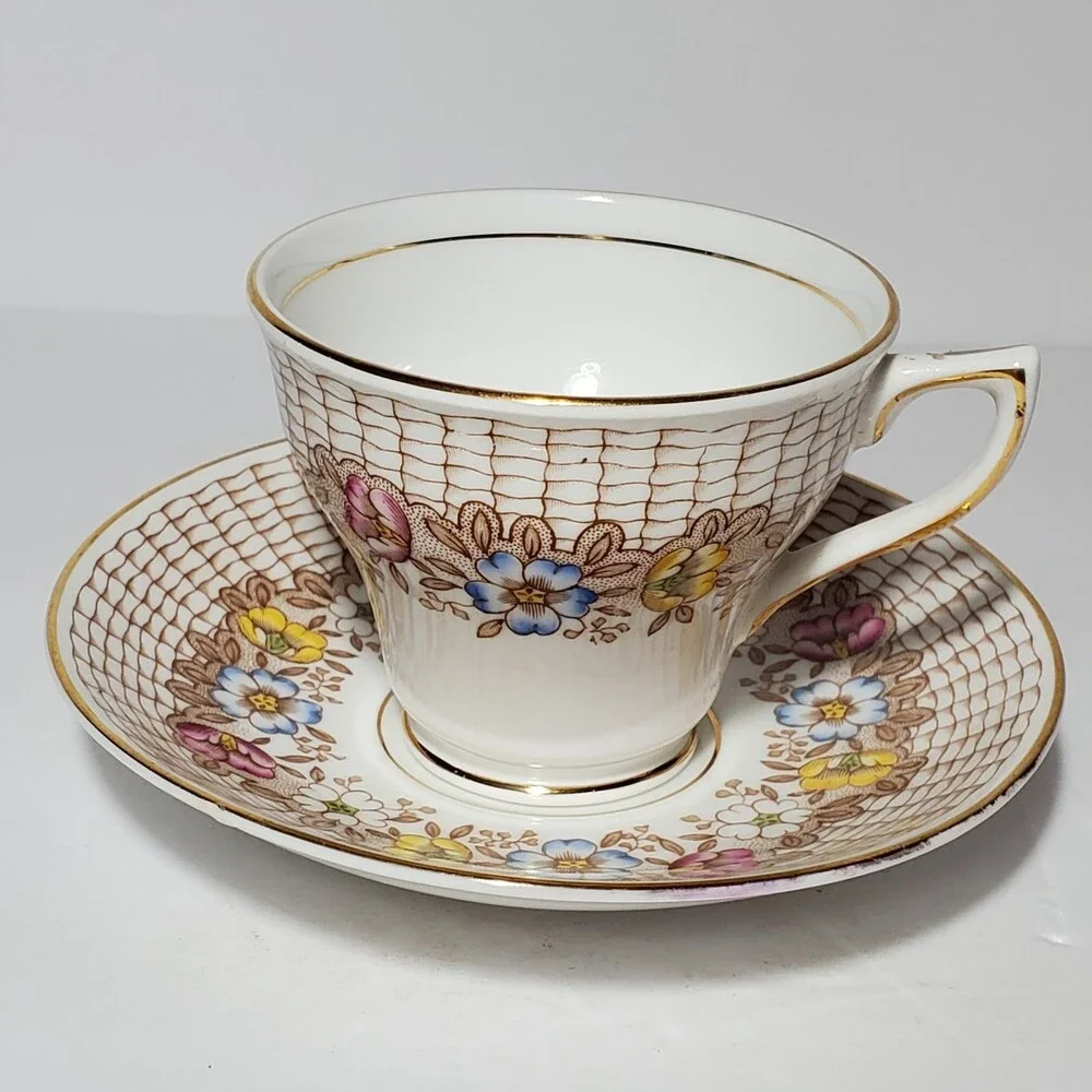 Rosina Teacup and Saucer Floral Basket Weave Pink Blue Flowers Vintage